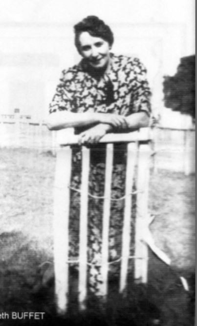 darkened-photo-of-madam-buffet-standing